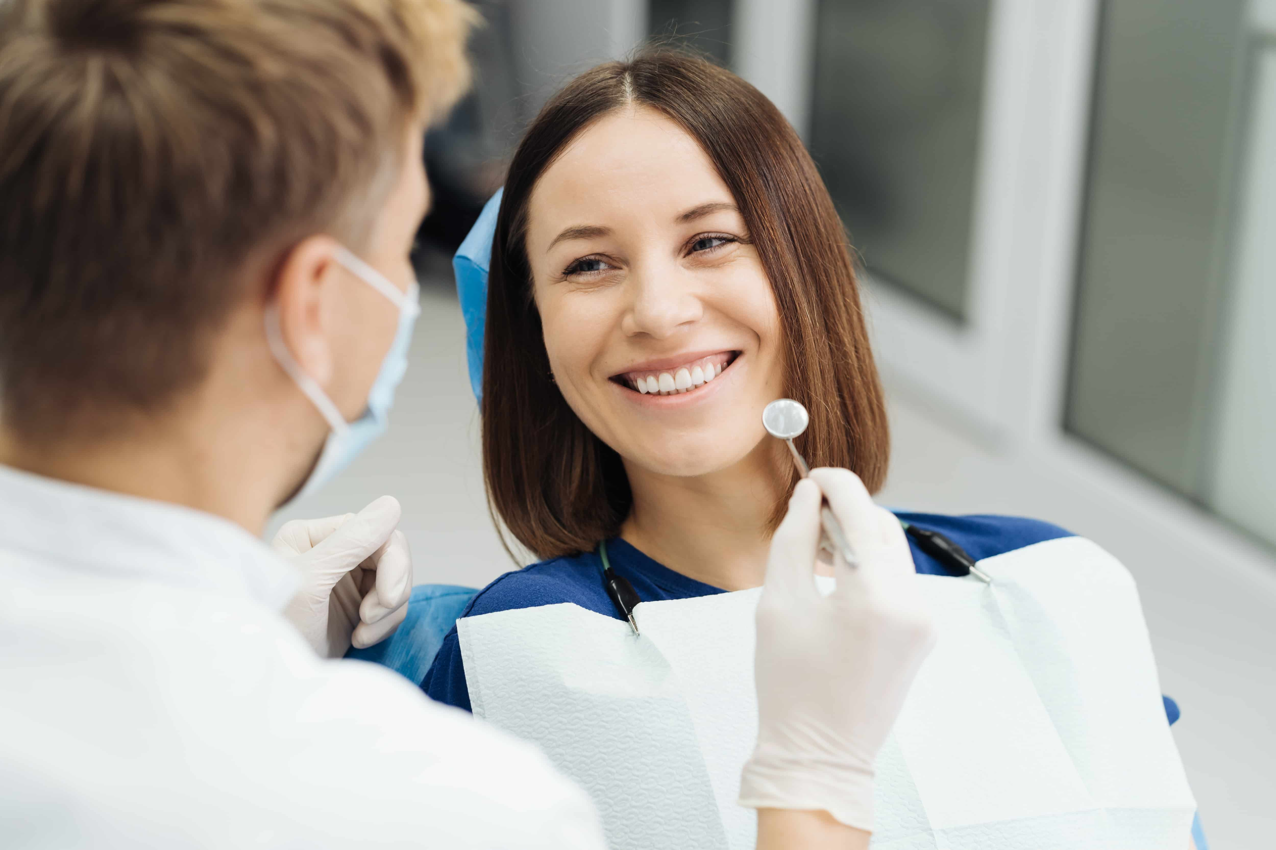 Best Dentist In Mandurah | Silver Sands Family Dental Male Professional Dentist With Gloves Mask Discuss What Treatment Will Look Like Patient S Teeth Scaled